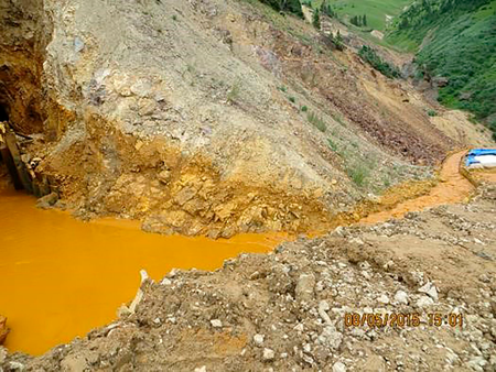 Yellow mine waste water is seen at the entrance to the Gold King Mine in San Juan County, Colorado, in this picture released by the Environmental Protection Agency (EPA) taken August 5, 2015.