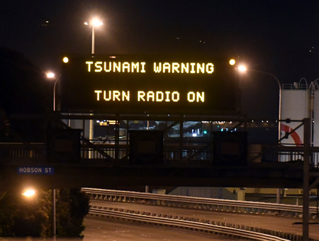 Motorway sign warning of Tsunami, in Wellington, Monday, Nov. 14, 2016, after a major earthquake struck New Zealand&#039;s south Island early Monday. A powerful earthquake struck in a mostly rural area close to the city of Christchurch but appeared to be more strongly felt in the capital, Wellington, more than 200 Km (120 miles) away.