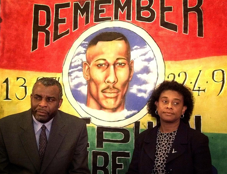 The Parents of murdered black teenager Stephen Lawrence, Neville (L) and Doreen, speak to the media ..