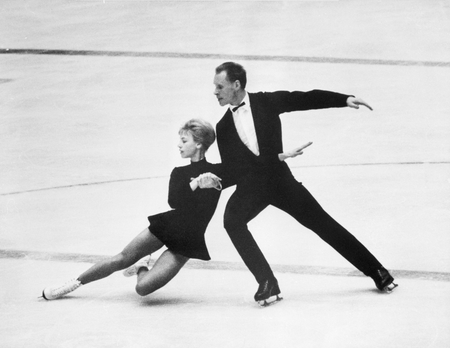(Original Caption) 1/29/64-Innsbruck, Austria: Lumilla Belousova and Oleg Protopopov (Soviet Union) during their performance (she is dipping) in the Olympic pairs figure skating competition tonight in the Olympic Ice Stadium here. The Russian team won the Gold Medal with 104.4 points. The German team Marika Kilius and Hans-Jurgen Baummer placed second with 103.6 seconds.