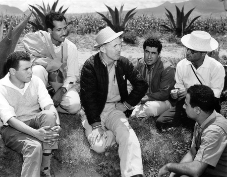 Norman Borlaug (center) in the field in Mexico with a group of young international trainees.