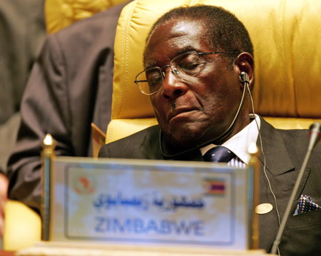 Zimbabwe&#039;s President Robert Gabriel Mugabe closes his eyes during the Africa Union meeting in Sirte, Libya July 4, 2005. Buoyed by a surge of global goodwill, Africa kept pressure on the rich world on Monday with its leaders readying a call for fairer trade and debt cancellation in the fight against poverty. A gathering of the 53-nation African Union (AU) in Libya which opened on Monday will agree a message to send to a summit of the Group of Eight (G8) rich nations in Scotland later this week about rescuing the continent of 800 million from poverty, war and disease.