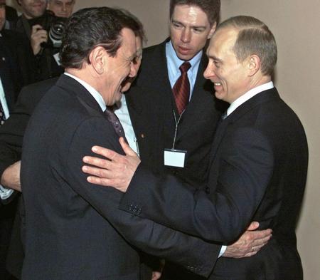 Putin and Schroeder hug