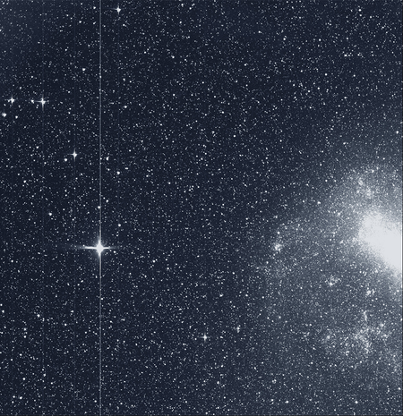 The Transiting Exoplanet Survey Satellite (TESS) took this snapshot of the Large Magellanic Cloud (right) and the bright star R Doradus (left) with just a single detector of one of its cameras on Tuesday, Aug. 7. The frame is part of a swath of the southern sky TESS captured in its “first light” science image as part of its initial round of data collection.
