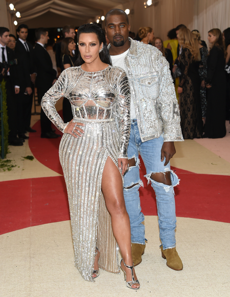 Kim Kardashian, left, and Kanye West arrive at The Metropolitan Museum of Art Costume Institute Benefit Gala, celebrating the opening of &quot;Manus x Machina: Fashion in an Age of Technology&quot; on Monday, May 2, 2016, in New York. (Photo by Evan Agostini/Invision/AP)