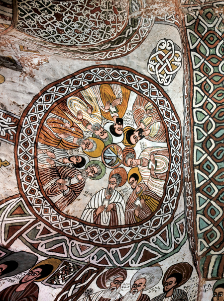 The dry air and lack of humidity has preserved these frescoes in their original perfection. On the left cupola are nine of the Apostles. On the right are eight of the Nine Saints. Clockwise from the bottom: Aragawi, Alef, Guba, Tsehema, Pantalewon, Garima, Likanos, and Aftse.
