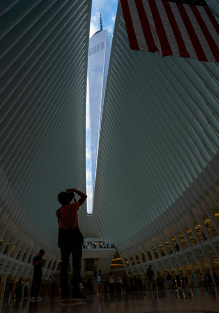 One World Trade Center appears through the roof of the Oculus transportation hub Sunday, Sept. 11, 2016, on the 15th anniversary of the attacks on the World Trade Center in New York.
