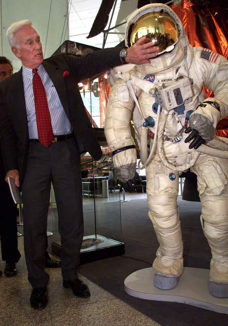 Eugene Cernan, the last man to walk on the moon, touches the visor of the helmet of NASA astronaut Neil Armstrong, first man on the moon at an exhibit in Frankfurt, July 20. The exhibtion marks the 30th anniversary of the Apollo 11 moonwalk.