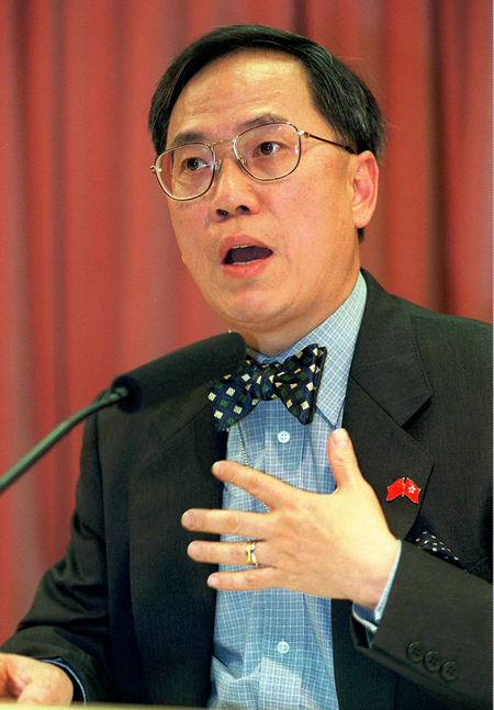Hong Kong&#039;s Financial Secretary Donald Tsang gestures during a press conference Friday, May 29, 1998 in Hong Kong. Tsang said that Hong Kong&#039;s economy contracted for the first time in almost 13 years in the first quarter of Asia&#039;s financial crisis.