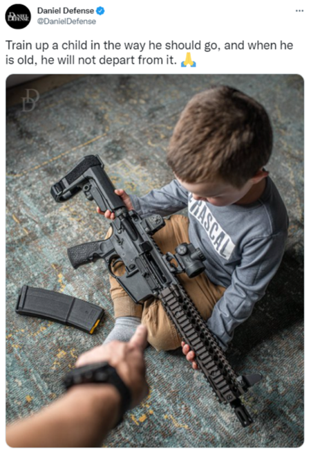 A Daniel Defense ad shows a toddler holding a long gun.