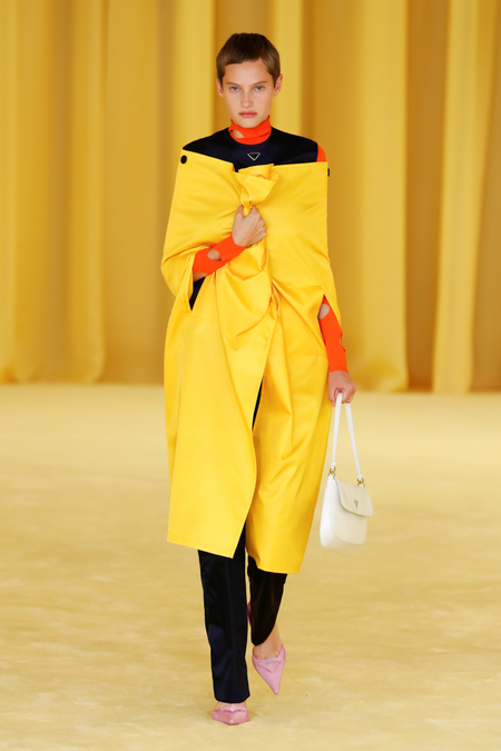 A model presents a creation from the Prada Spring/Summer 2021 women&#039;s collection during fashion week in Milan, Italy, in this handout photo released on September 24, 2020.