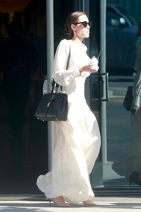 Beverly Hills, CA - *EXCLUSIVE* - Actress Angelina Jolie was seen smiling wide as she headed out from II Pastaio restaurant in Beverly Hills where the actress had lunch with son Pax before heading to Fred Segal for a little afternoon retail therapy.