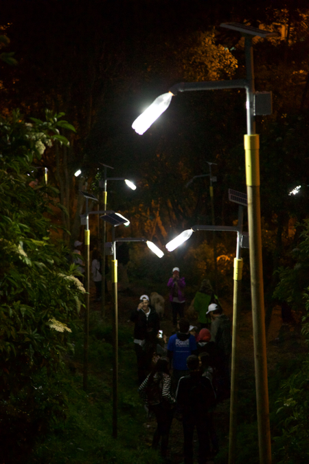 Liter of Light streetlamps lit up at night in San Luis, Bogota