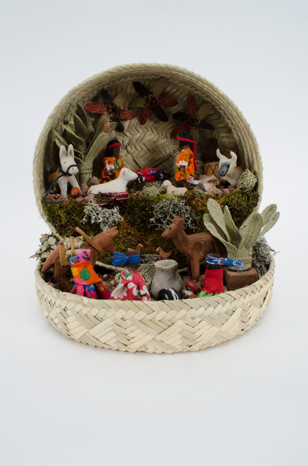 Mexican nativity scene in a basket.