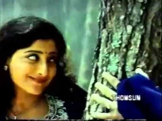 Illustration for article titled Mizhi Randilum Film Mp3 Download