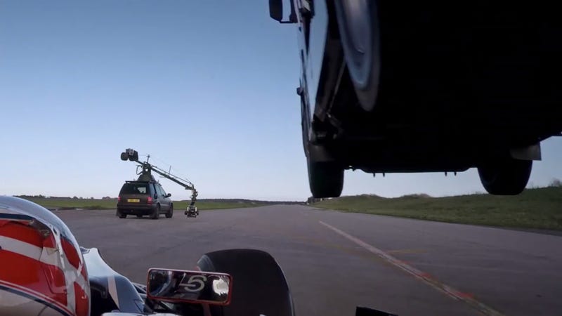 Illustration for article titled See How This Team Actually Jumped A Big Rig Over A Speeding F1 Car