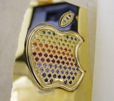 Illustration for article titled Gold MacBook Air Has Bejeweled Rainbow Apple