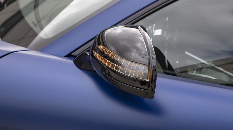 A side mirror on the European-spec Mercedes-AMG GT C Coupe.