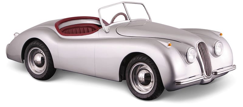 Illustration for article titled A Tiny Drivable Jaguar Replica Might Be the Perfect Car For Big City Commutes