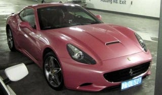 Illustration for article titled Why, God, Why Did Someone Paint a Ferrari California Rose Pink?
