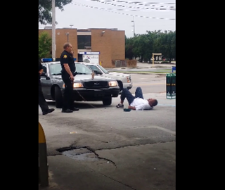 Charles James Lang Jr. lies on the ground after being tased by the unidentified deputy.YouTube screenshot