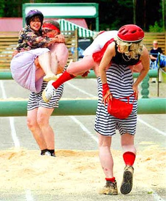 Illustration for article titled Wife-Carrying, Rosary Clutching, Speed Dating: Valentine's Day Is A Global Affair