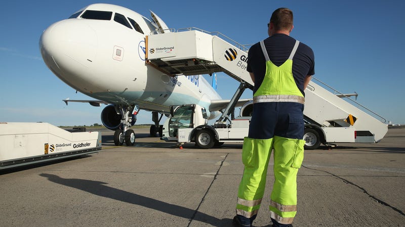 Illustration for the article entitled Flight Turned Back After pilot spilled coffee causing control panel to melt and smoke