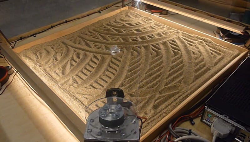 Illustration for article titled Four Stepper Motors Can Make Beautiful Sand Art