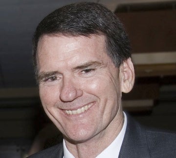Federal District Judge John Roll is laid to rest.