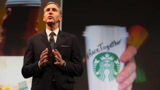 Starbucks Chairman and CEO Howard Schultz addresses the Race Together campaign during the Starbucks annual shareholders meeting March 18, 2015, in Seattle. Stephen Brashear/Getty Images