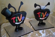 Illustration for article titled TiVo on Comcast Rollout Behind Schedule, Catholic Bear-Pope Shits in Woods