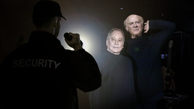 Simon, Garfunkel Pose Perfectly Still In Rock And Roll Hall Of Fame Exhibit To Avoid Security Guard Catching Them Living In Museum