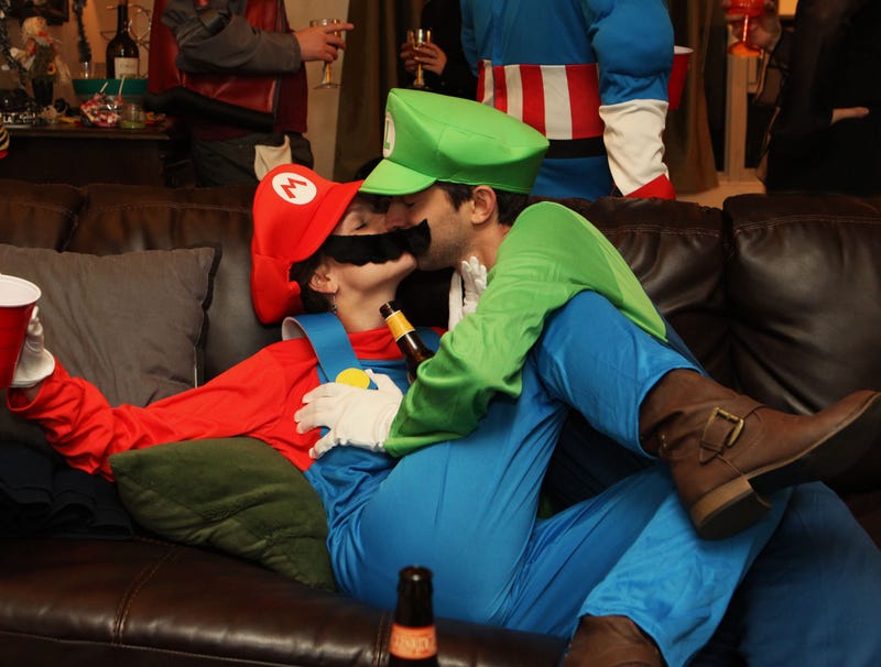 Couple Dressed As Mario And Luigi Drunkenly Making Out On