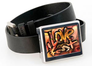 Illustration for article titled Egokast Video Belt Buckle