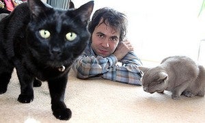 Illustration for article titled Cat Man Says Cat Lovers Are Better People