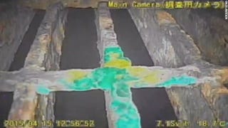 Illustration for article titled What The Hell Is This Strange Green Glow Inside The Fukushima Plant?