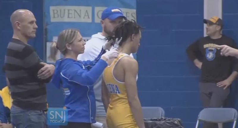 Illustration for article titled High School Wrestling Ref Who Called Colleague The N-Word Makes Black Wrestler Cut Off His DreadlocksÂ
