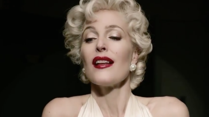 Gillian Anderson as Media, depicting herself as Marilyn Monroe.