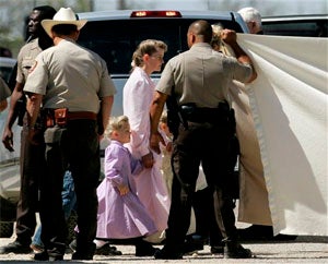 Illustration for article titled Polygamist Sect Raided On Charges Of Abuse Of Girls