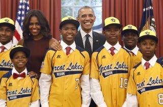 President Barack Obama and first lady Michelle Obama with the Jackie Robinson West All Stars in the White House Nov. 6, 2014YURI GRIPAS/AFP/Getty Images