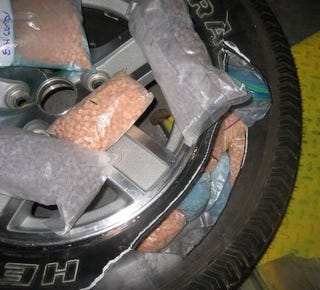 Illustration for article titled Canadians Smuggle $2.1 Million Of Ecstasy In Spare Tire