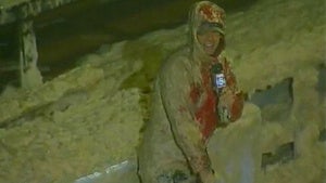 Illustration for article titled TV Reporter Gives Hurricane Irene Update While Covered in Toxic Waste