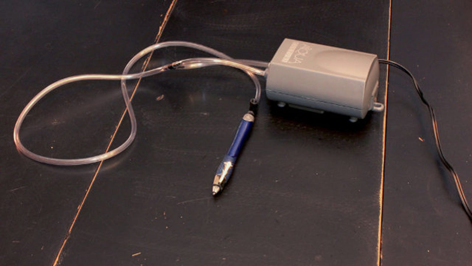 An Aquarium Air Pump Into Electric Vacuum Pen