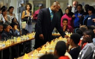 Illustration for article titled Black Chess Grandmaster Promotes Sport to Kids