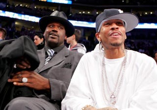All-Stars Shaquille O'Neal and Allen Iverson sit courtside during the Got Milk? Rookie Challenge, part of 2005 NBA All-Star Weekend at the Pepsi Center in Denver on Feb. 18, 2005.Ezra Shaw/Getty Images
