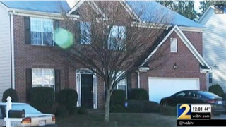 Fulton County, Ga., police were called to this home shown police say a 13-year-old accidentally shot his mother while playing with a gun he’d found in his neighborhood. WSB-TV screenshot