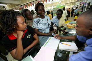 Making a money transfer in Kenya via mobile phone.