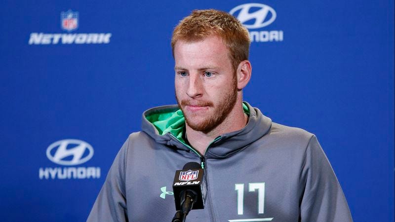Illustration for article titled Carson Wentz Hoping To Just Skip To Part Where He’s Respected Veteran Backup QB