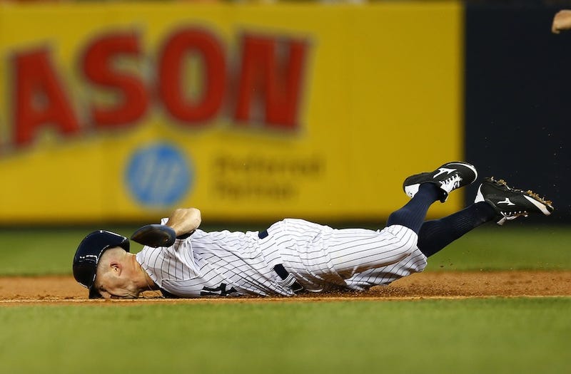 Illustration for article titled Here's A Beautiful Photo Of Brett Gardner Eating Dirt