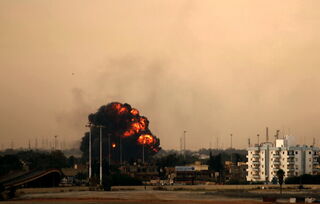 Libyan jet bomber crashed after being shot down in Benghazi. (Getty Images)